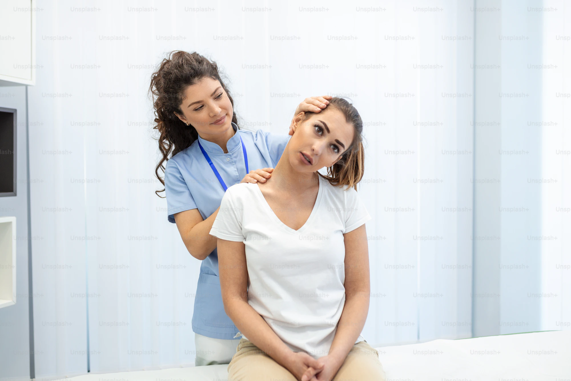 Physiotherapist treating a patient's back at Aroha clinic in Hyderabad